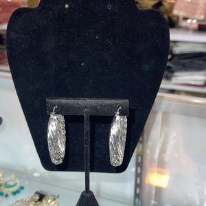 Twisted Hoops in silver color all new just came in